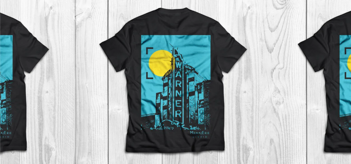 Menajerie Studio branded merchandise with Warner theater graphic